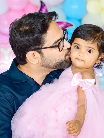 A magical 'Unicorn' themed birthday party, with pastel colors, shimmering backdrops, and unicorn illustrations, creating a whimsical and dreamy atmosphere.