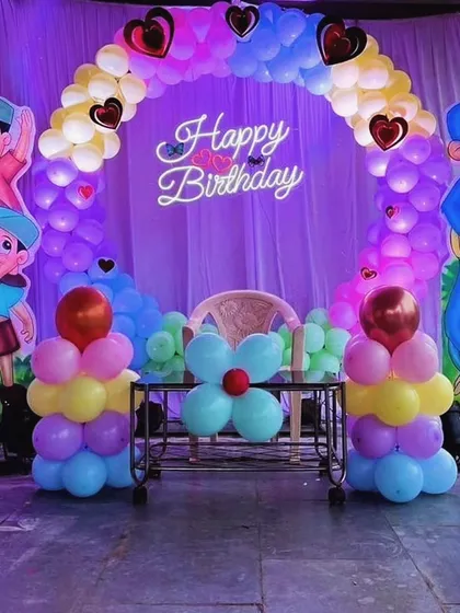 Bringing the world of Chhota Bheem to life for a super fun kids' birthday party. This decoration includes large, colorful cutouts of the characters, a vibrant balloon arch with built-in lights, and a bright neon 'Happy Birthday' sign. I love creating these custom cartoon themes that get everyone excited.