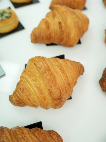 Another shot of our students' beautiful croissants, showcasing the consistent quality they achieve through our hands-on training.