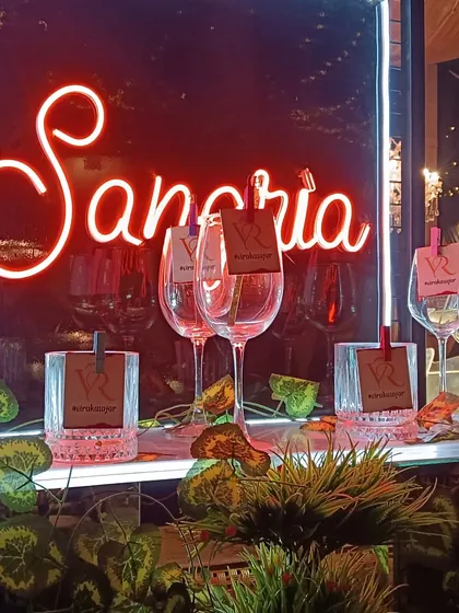 It's all in the details. For this Sangria bar, I added custom glass tags with the couple's initials, making each drink feel personal. This is a small touch that makes a big difference.