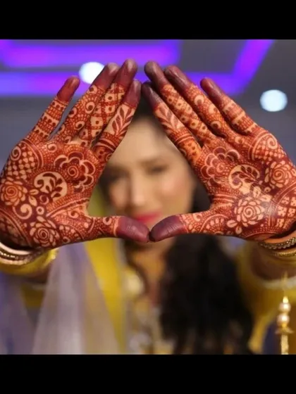 A creative shot showcasing the beautiful henna stain. The deep, uniform color on the palms is a result of my natural henna paste and proper aftercare.
