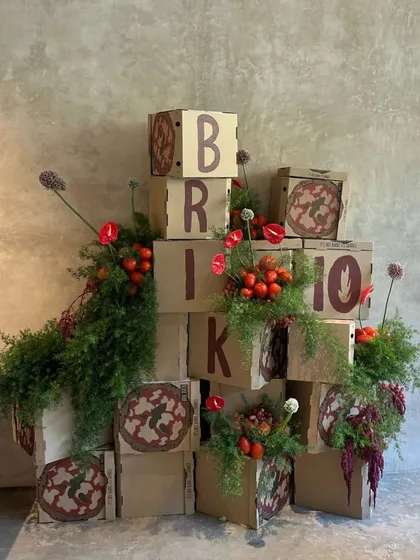 For Brik Oven's 10th outlet launch, we turned their pizza boxes into the building blocks of a community art installation. This is how I help brands create memorable launch events, by transforming their own products into an interactive experience that gets everyone talking and creating together.