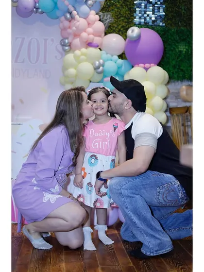 A precious family moment captured at the Candyland party. These are the memories you'll cherish forever.