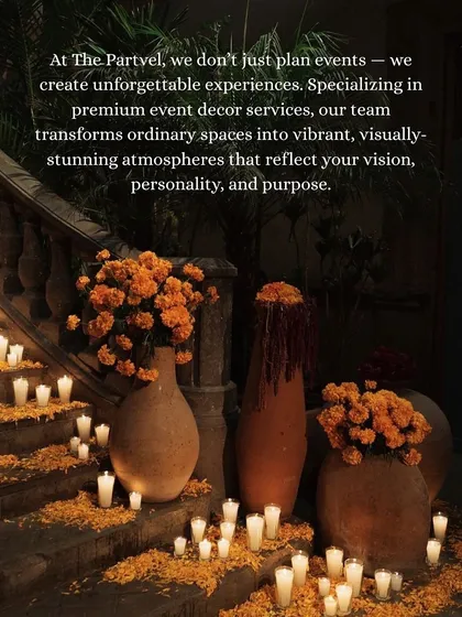 We don't just plan events, we create unforgettable experiences. This image of a staircase adorned with marigolds and candles captures the warm, inviting, and visually stunning atmospheres we create.