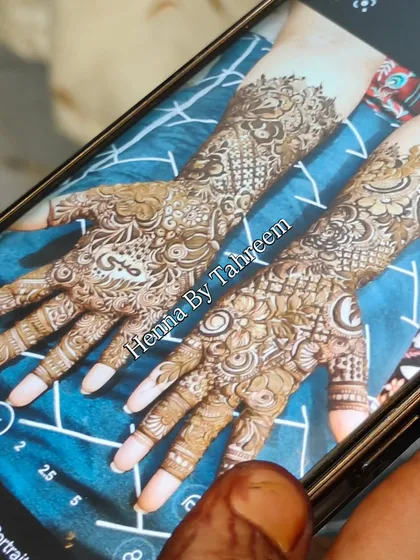 Capturing the final result. I always take photos of my work to make sure every detail is perfect, just like in this intricate bridal design. Mashallah.
