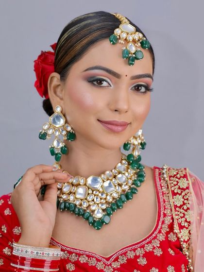 A close-up of the student's work, showing a flawless base and sharp eye makeup. This is the quality I expect and train my students to achieve.