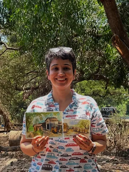 Me holding two of my watercolour paintings from our sketch walk in Aarey Forest. It was a productive and inspiring day of painting outdoors.