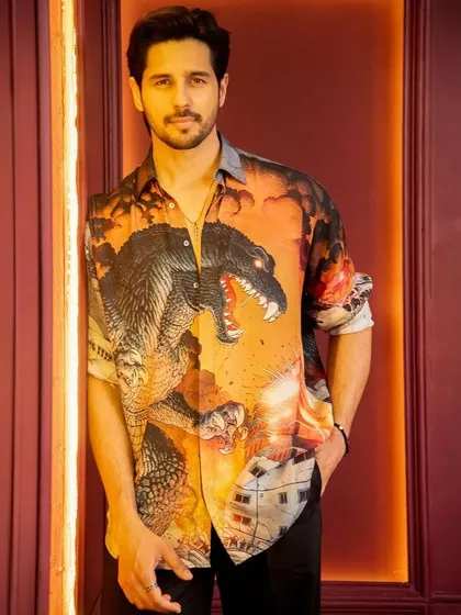 A slightly different pose showing the relaxed confidence of the look. This kind of celebrity styling is about finding pieces that are both fashionable and comfortable for the talent.