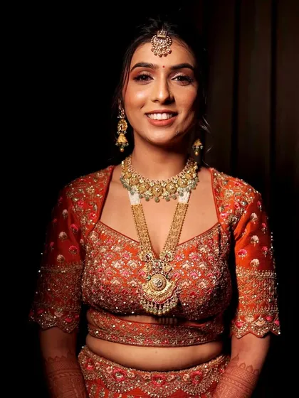 A final portrait before heading to the ceremony. The makeup is set and perfect, ready for the long day ahead.