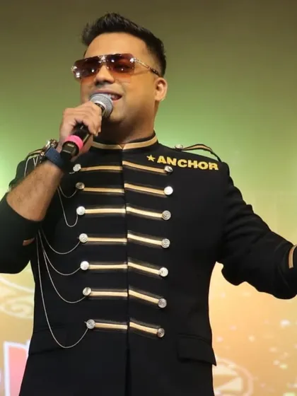 My outfit is part of the performance. This custom bandmaster jacket is just one example of how I dress to match the energy and grandeur of your event, ensuring I look the part of a powerhouse emcee.