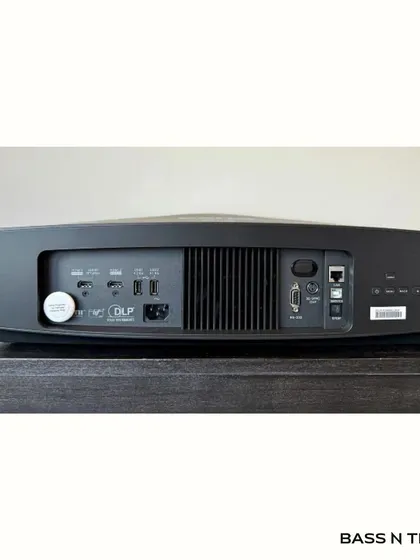The back panel of the BenQ W5800 shows the connectivity required for a high-performance setup. We handle the complete integration, ensuring your projector works seamlessly with your audio processor, players, and control systems for a simple, one-touch movie experience.