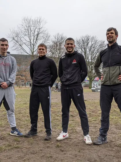 We train anywhere we can. Here's our wrestling crew after a great practice session in the park, where we reviewed bicep ties, arm drags, and low-impact takedowns.