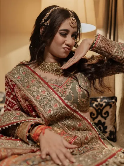 Another playful pose from a fun-loving bride, showing her personality and excitement.