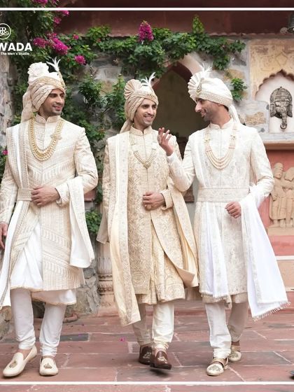 A candid moment between three grooms, their laughter and style filling the frame. The Shauhar collection is designed for creating such unforgettable memories.