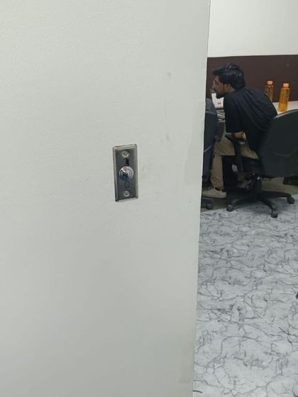 This is an exit switch for an RFID card and password-based access control system. It's a simple and durable solution for managing entry and exit.