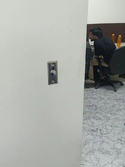 This is an exit switch for an RFID card and password-based access control system. It's a simple and durable solution for managing entry and exit.