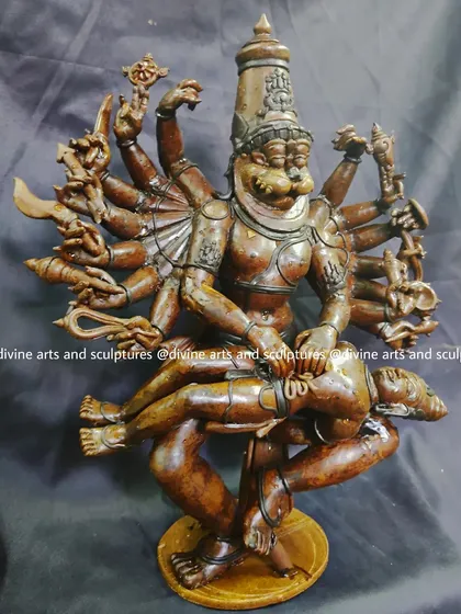 The wax stage of a formidable Ugra Narasimha sculpture. The raw power and intensity of the deity disemboweling the demon Hiranyakashipu are captured in this detailed wax form.