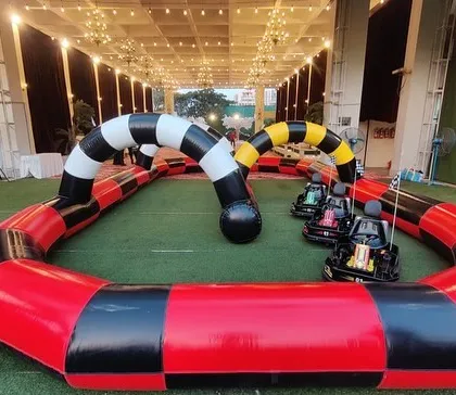 We provide a full Go-Karting experience with an inflatable track and multiple electric karts. This setup is perfect for larger spaces and provides safe, high-speed fun for kids and teens.
