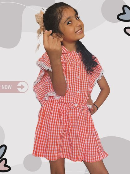 A sweet co-ord set for your little bear. The pink check pattern is timeless, and the white lace on the sleeves adds a delicate touch. The skorts make it practical for any activity.