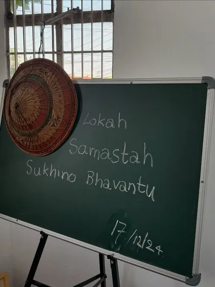 "Lokah Samastah Sukhino Bhavantu." May all beings everywhere be happy and free. This mantra on a chalkboard from a session in Mysore captures the universal intention of our practice.