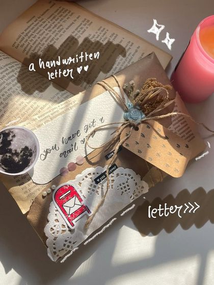 A handwritten letter is more than just a gift, it's an emotion. Here's a beautifully wrapped letter, complete with a moon sticker and a wax seal, ready to make someone's day.