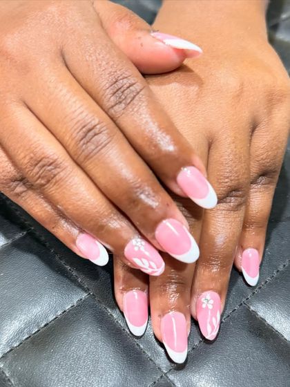 This angle highlights the glossy finish and perfect shape of this elegant French manicure set.