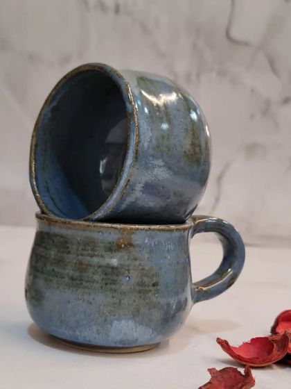 A set of two espresso cups, perfect for sharing a moment. These are made with food-safe, non-toxic glazes and are designed to be cherished.