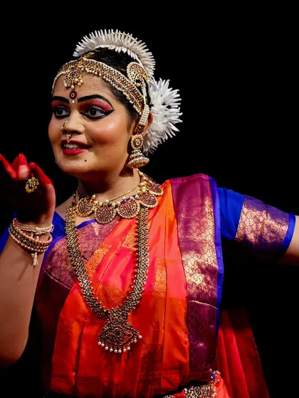 A close-up of a classical dancer's expressive face and hands. I focus on capturing the storytelling aspect of the dance.