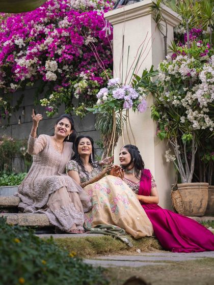 Another fun moment with the bride and her tribe. The makeup is designed to look great in person and in photos, capturing all the joy of the day.