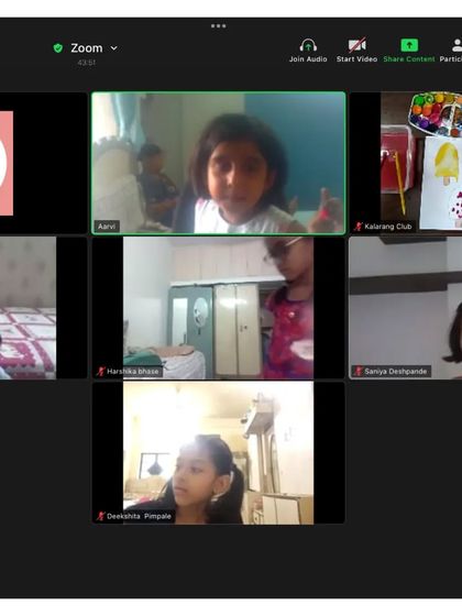 A glimpse into an interactive online session. Here, a student is sharing her work and ideas with the class, fostering communication and confidence in a virtual setting.