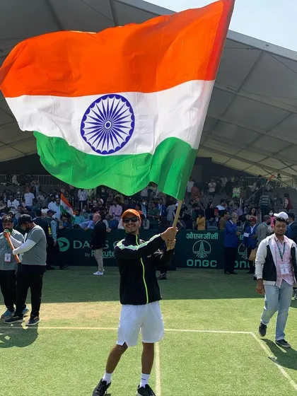 Waving the tricolor high after a win on home soil. The energy of the crowd and the pride in representing India is a feeling that never gets old.