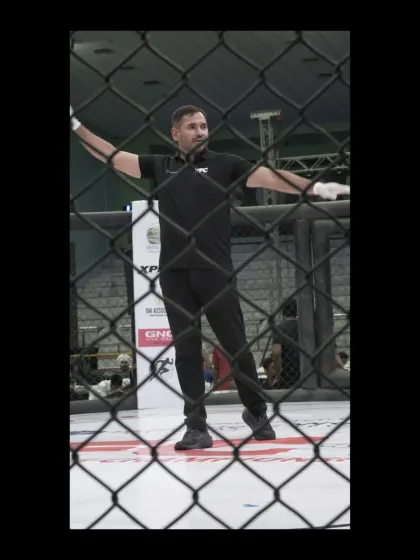 Our coach in his element, officiating a professional MMA bout. This level of experience is what we bring to every training session.