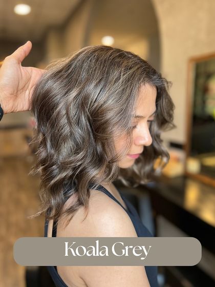 This Koala Grey color is a unique, cool-toned look with ashy grey and blonde highlights. It's perfect for someone wanting a trendy, edgy style.