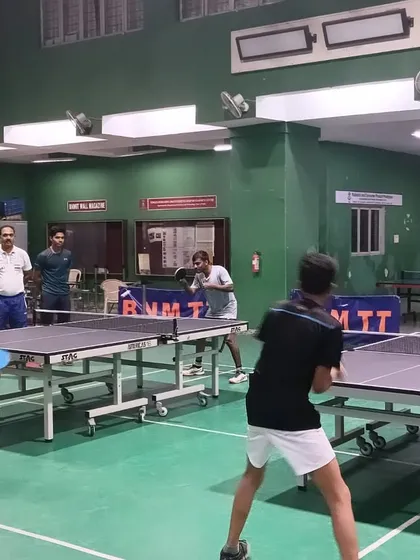 Here is a glimpse of our active training hall, featuring multiple simultaneous matches on our professional-grade Stag tables. We ensure a high-energy environment where players can engage in quality practice and competitive play on our cushioned, safe flooring.