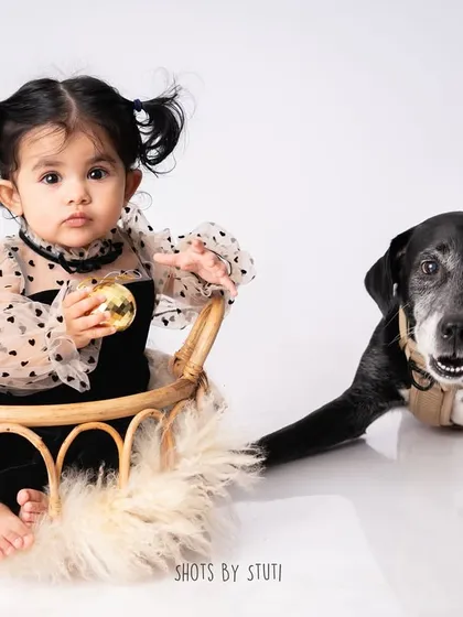 Capturing a perfect photo with a baby and a pet can be an adventure. Sometimes it takes a little Photoshop magic to combine the best moments into one frame, but the result is always worth it.