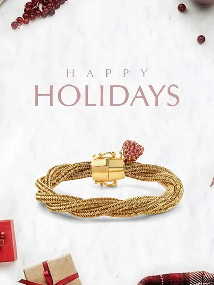 Celebrate the magic of the season with this custom bracelet. It features intricate braided gold detailing and a ruby-studded heart charm, adding a perfect touch of festive sparkle to your holiday style.