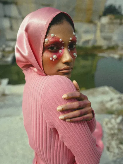 This shot is from a conceptual editorial where we explored the contrast between soft textures and raw nature. The styling focused on monochromatic layering and avant-garde makeup to create a striking, otherworldly visual.