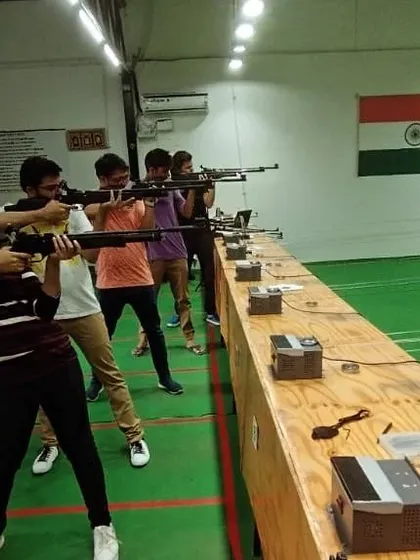 Here's a group of friends getting their first taste of air rifle shooting. I guide everyone on the proper stance and technique, so you can focus on the fun of friendly competition.