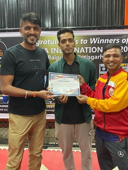 Fight Capital - MMA & Combat Fitness Training Our Fight Team: Forging Champions photo 21