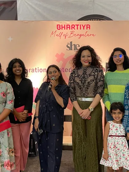 A happy moment with participants after a successful styling workshop. It's rewarding to see women, and even young girls, get excited about fashion and personal expression.