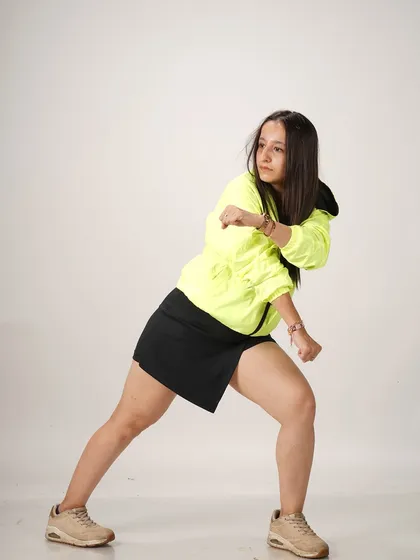 This pose shows the fusion of energy and control that I bring to my choreography.