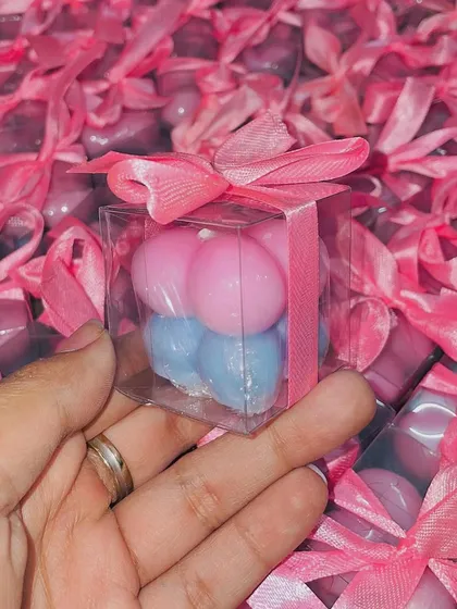 A close-up of the pink and blue bubble candles for the #POOKASH baby shower. These are a fun and modern way to celebrate the upcoming arrival.