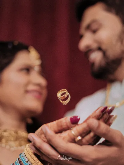 It is the small details that hold the biggest stories. This creative ring shot symbolizes the promise of forever, captured with an artistic touch to make the memory unique.