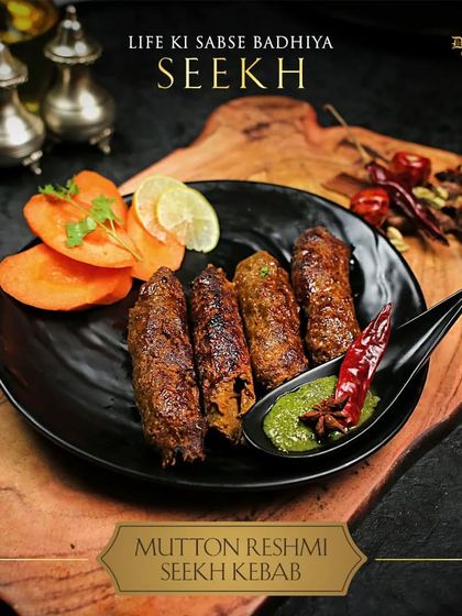 Life ki sabse badhiya seekh, our Mutton Reshmi Seekh Kebab. Made from finely minced mutton and blended with delicate spices, these kebabs are known for their soft, "reshmi" or silky texture.