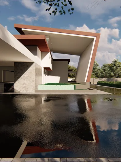 A large water body at the entrance reflects the building's dramatic angles. We often use water as a design element to create a sense of tranquility and to mirror the architectural forms.