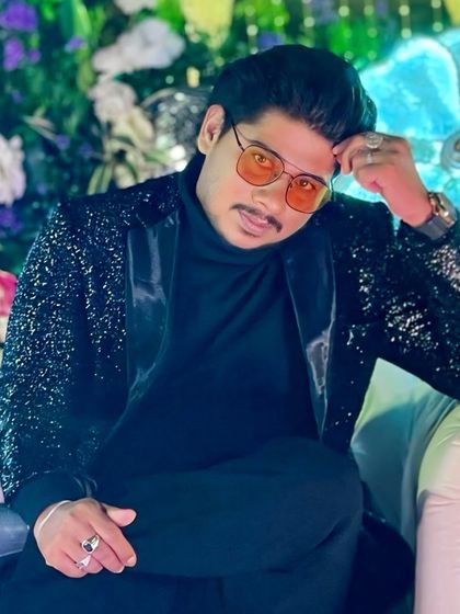 Posing on the beautifully decorated stage. As a host, I appreciate the effort that goes into creating a stunning ambiance for an event.