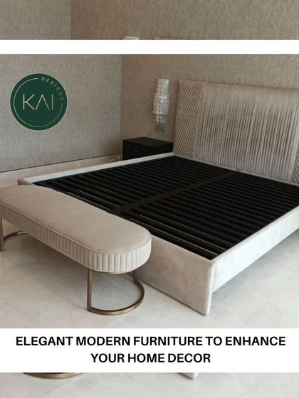This elegant modern bedroom set includes a bed with a pleated, winged headboard and a matching bench with a curved metal base. The cohesive design and soft, neutral upholstery create a sophisticated and serene atmosphere.