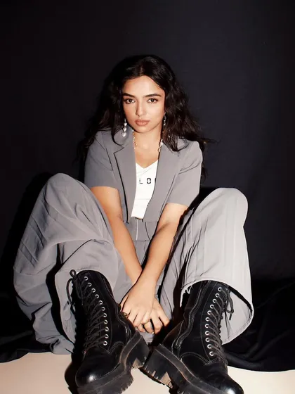 I loved creating this edgy, preppy look for Ahsaas Channa's feature in GQ India. We paired a cropped blazer and pleated skirt with chunky combat boots to create a cool, youthful vibe that feels both powerful and playful.