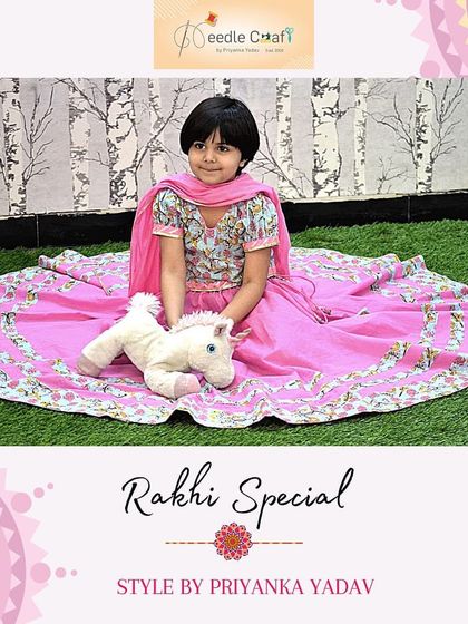 This bright pink cotton lehenga with a floral choli is a perfect Rakhi outfit. It's paired with a soft cotton dupatta, making it a comfortable and festive choice for a young girl. Image 26 shows another angle.