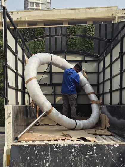 Something new and big is on its way. A 7-foot sculpture, carefully wrapped for transport to the installation site.